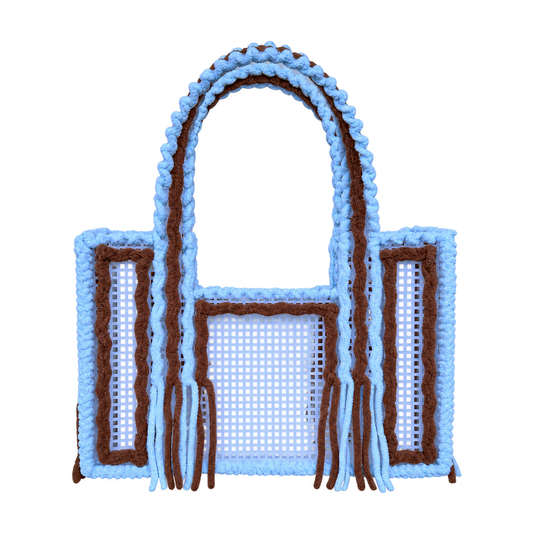 Front view of the Blue Cocoa handmade crochet mesh tote bag in sky blue and cocoa brown yarn with fringe