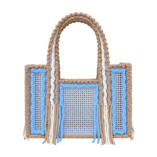 Front view of the Iced Latte handmade crochet mesh tote bag in latte beige, sky blue and white yarn with fringe