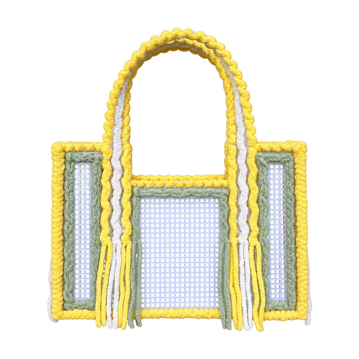 Front view of the Limoncello handmade crochet mesh tote bag in lemon yellow, white and sage green yarn with fringe