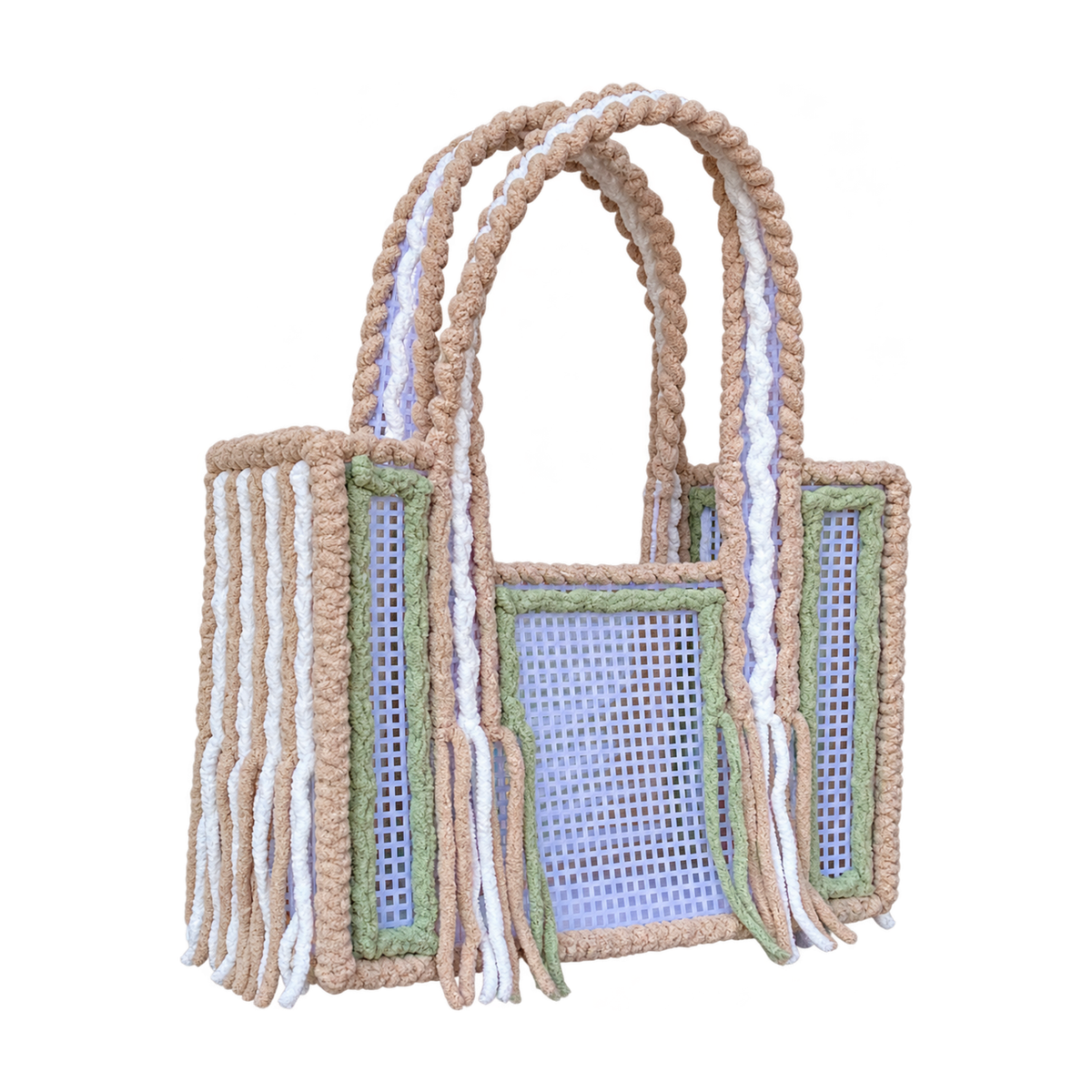 Side view of the Matcha Latte crochet mesh tote bag showing twin beige and white yarn-wrapped handles and fringe